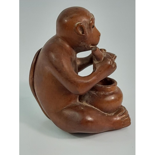 181 - Large signed carved monkey netsuke