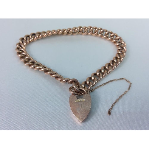 194 - 9ct gold bracelet with heart locket 8.2g