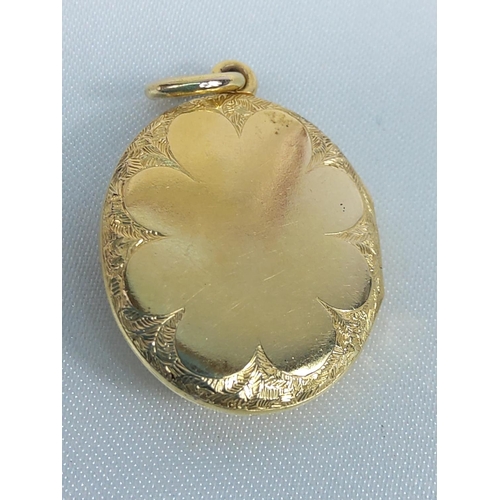 221 - 9ct gold oval locket 6.4g