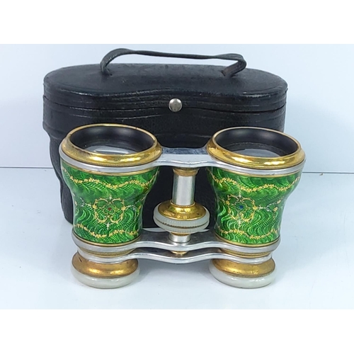 280 - Vintage green enamelled opera glasses in original leather case