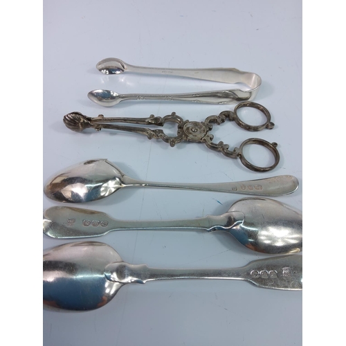 282 - 3 silver spoons, silver sugar nips and silver tongs, gross weight 113g