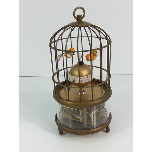 144 - Bird cage clock