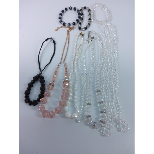 372 - 3 bags of costume jewellery