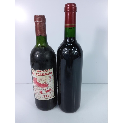 61 - 2 bottles of vintage wine