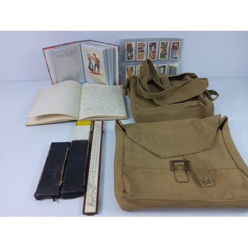 26 - Military bag, saucy postcards, collectors cards and slide rule