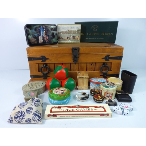 31 - Bound wooden box containing various games and puzzles