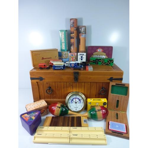 32 - Large bound wooden box containing various games and puzzles