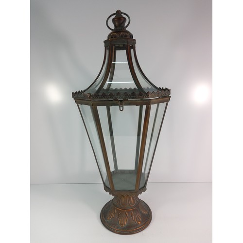 210 - Ornate metal and glass lantern, approx 69cms in height