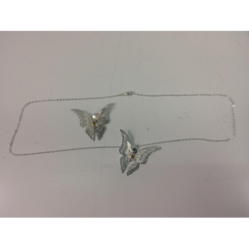 315 - Silver butterfly pendant on chain and a silver butterfly pendant, 4.7g