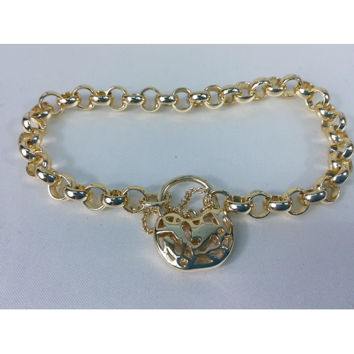 317 - Yellow metal bracelet with locket