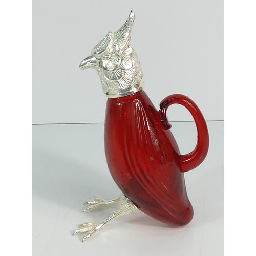 377 - Plated metal and red glass decanter, 14cms in height