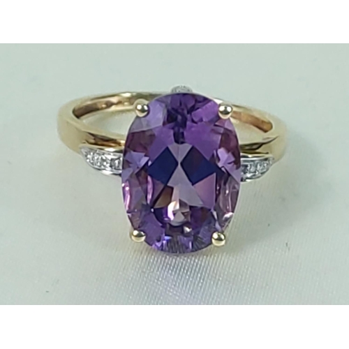 304 - 9ct gold amethyst and diamond dress ring, size P