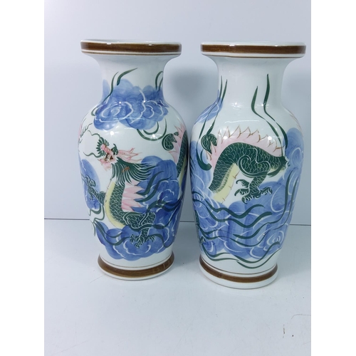 169 - Pair of Oriental decorated vases