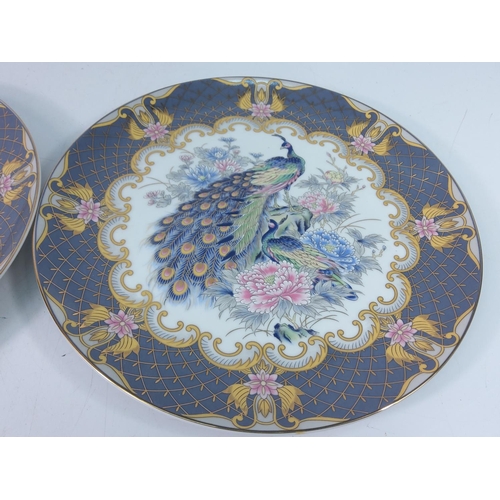 178 - 2 peacock decorated plates