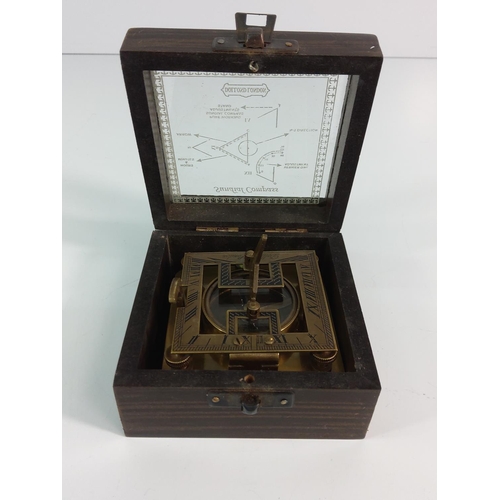 214 - Wooden cased brass sextant