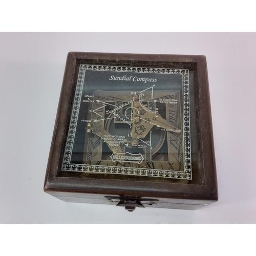 214 - Wooden cased brass sextant