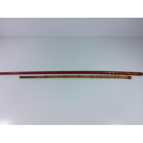 223 - Bamboo crop and a painted Georgian wooden swagger stick