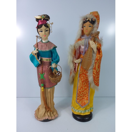 76 - 2 Oriental dolls, 38 cms tall