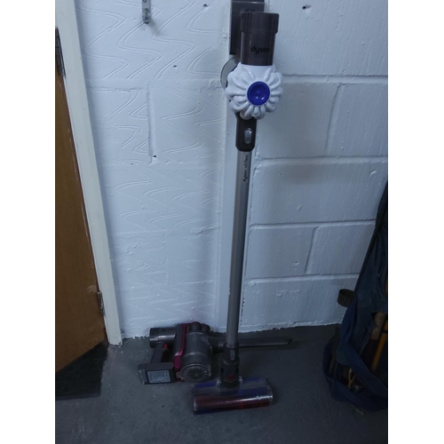 91 - 2 Dyson vacuums