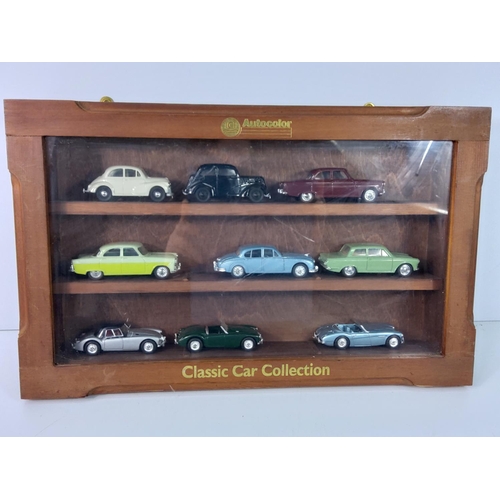 264 - Display case of model vehicles