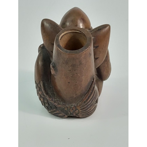 293 - Carved wooden candle holder