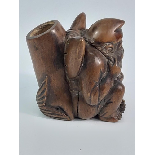 293 - Carved wooden candle holder