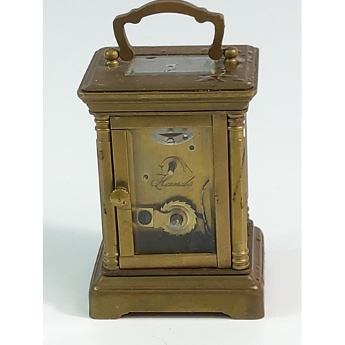 296 - Miniature carriage clock with porcelain panels