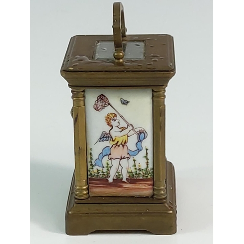 296 - Miniature carriage clock with porcelain panels