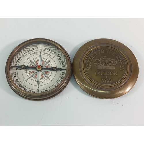 384 - Brass cased compass