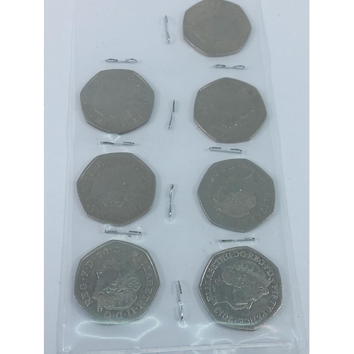 398 - 7 collectable 50 pence pieces