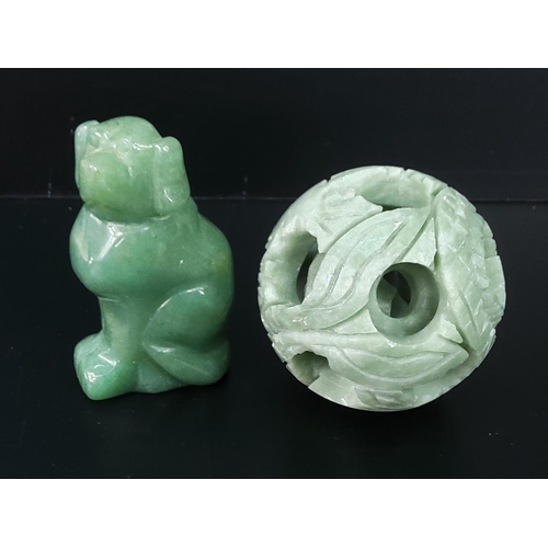 257 - Carved jade puzzle ball and dog figure