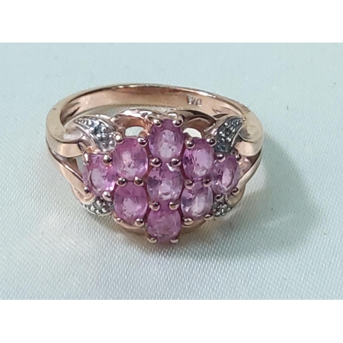 249 - 9ct gold pink sapphire and diamond ring, size O