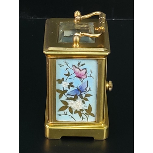 282 - Miniature carriage clock with porcelain panels and enamelled dial