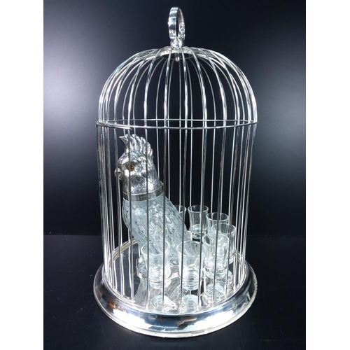 97 - Plated birdcage drinks set in the form of a caged parrot. 46cms in height