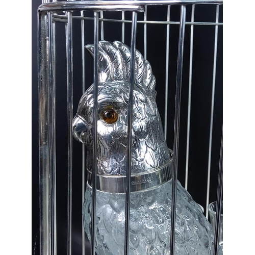 97 - Plated birdcage drinks set in the form of a caged parrot. 46cms in height