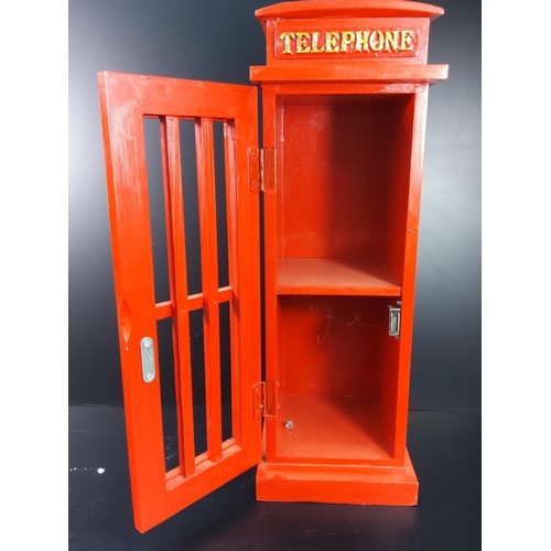 168 - Wooden telephone box storage cupboard, 52cms in height