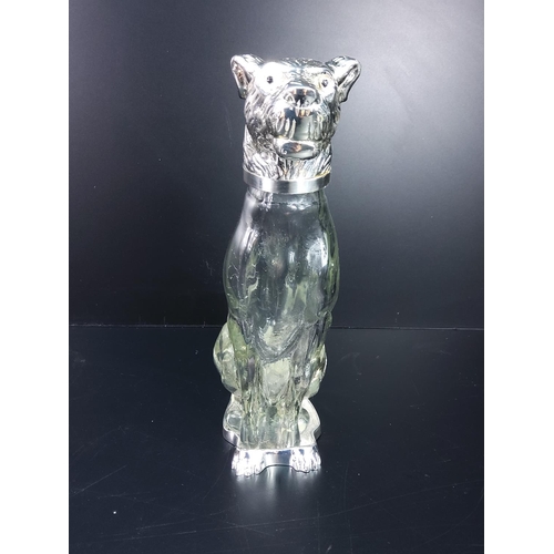 174 - Glass and plated decanter in the form of a dog, 25cms in height