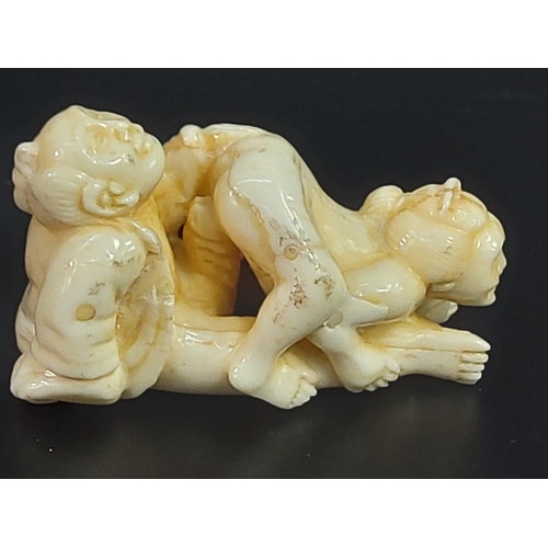 228 - Erotic carved bone netsuke