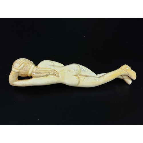 257 - Oriental carved bone figure of a nude lady