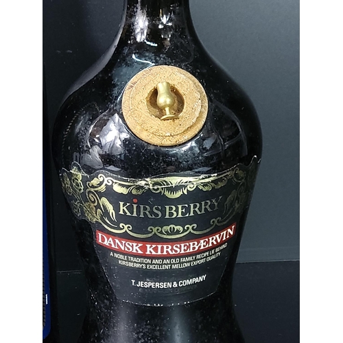 183 - Bottle of Kirsh and Captain Morgan Rum