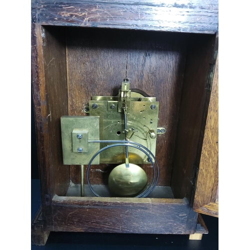 192 - Antique oak cased bracket clock