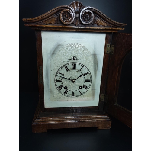 192 - Antique oak cased bracket clock