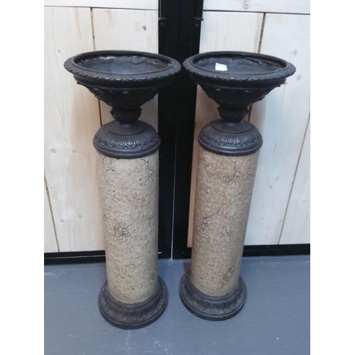 389 - A pair of large decorative planters, 95cms in height