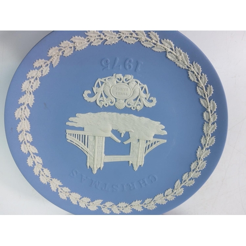 119 - 16 Wedgwood Jasperware year plates and a Jasperware bowl