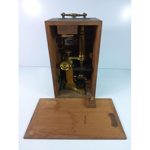 126 - Antique cased microscope and box of accessories