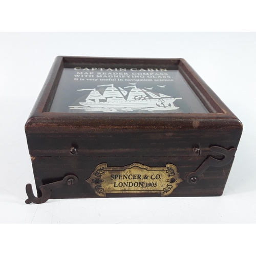 385 - Wooden cased compass