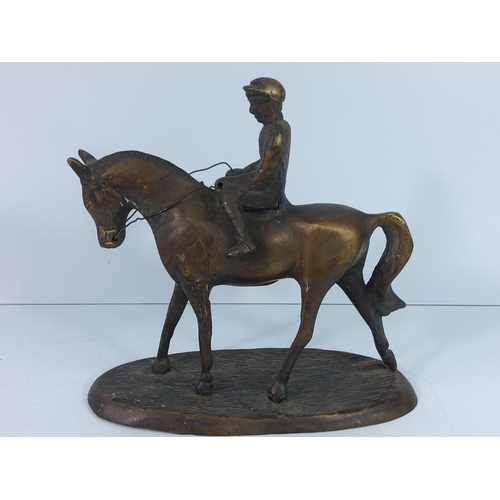 5 - Cast metal jockey and horse