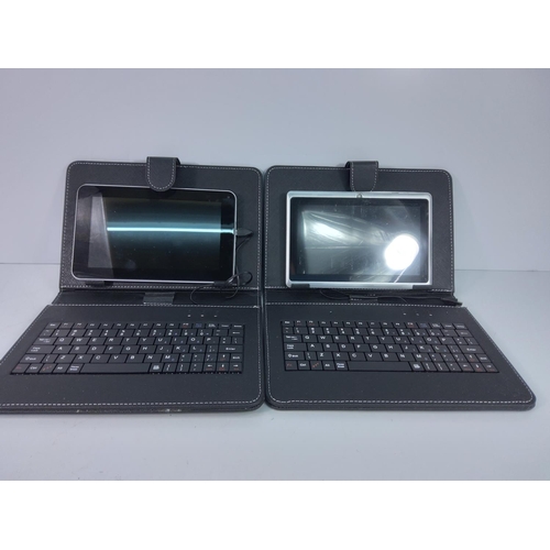 9 - 2 tablet PC's with keyboards