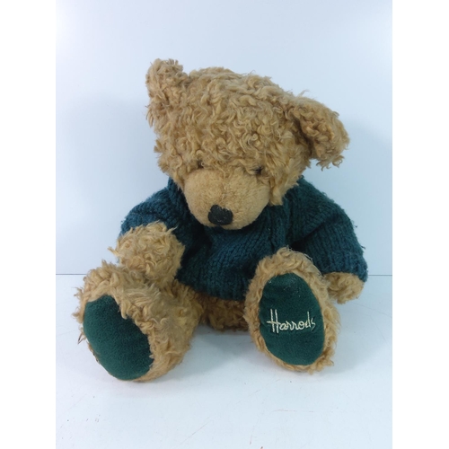 57 - Green Harrods hand puppet teddy bear