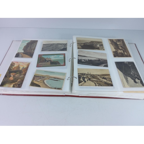 109 - Large album of postcards